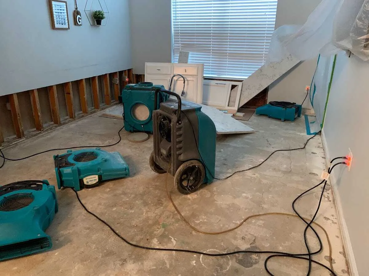 Dehumidifier in flood-cut room for Water Damage Restoration in Killingworth